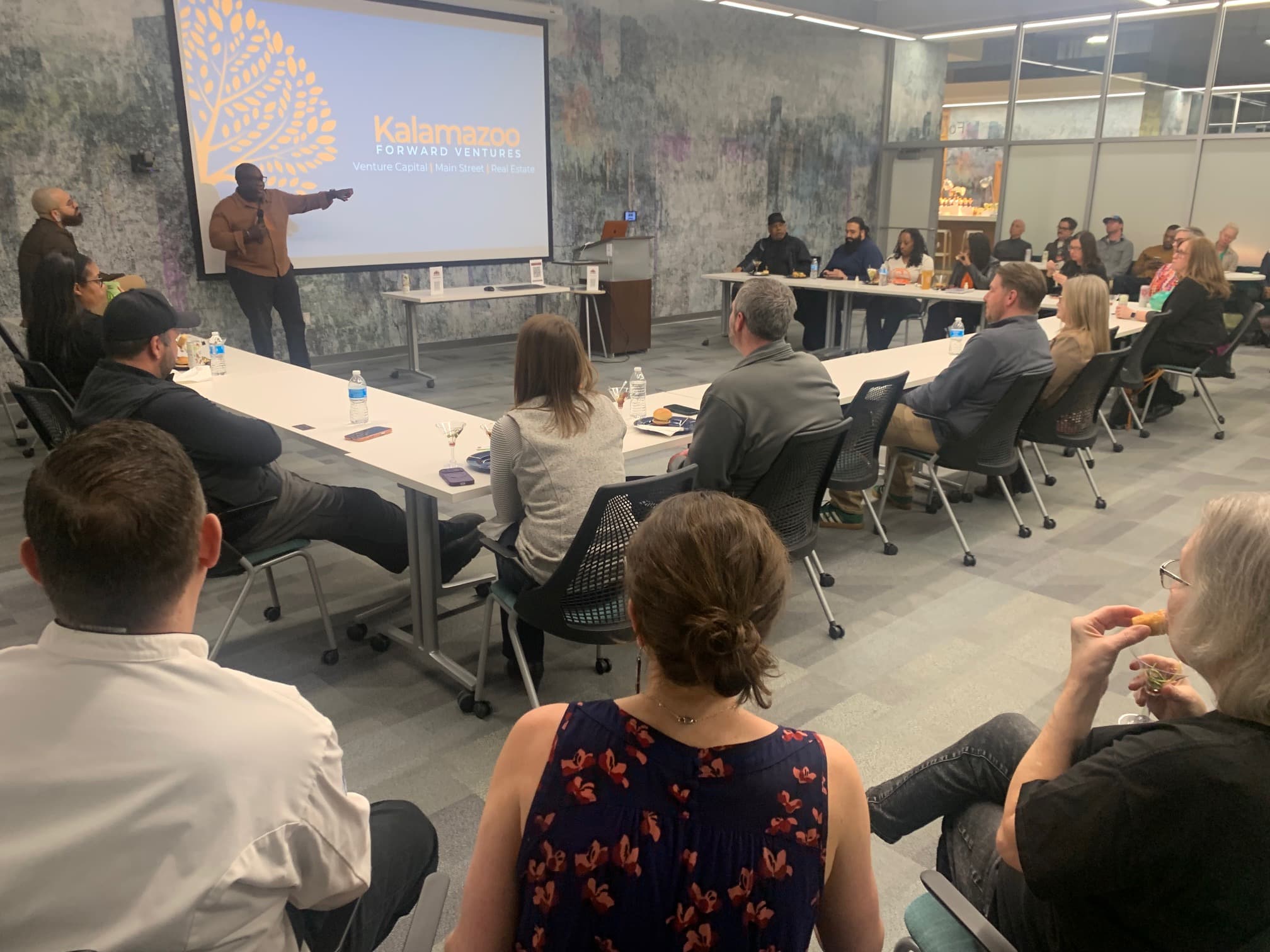 Kalamazoo entrepreneurs and community members attending a Reach Forward networking event