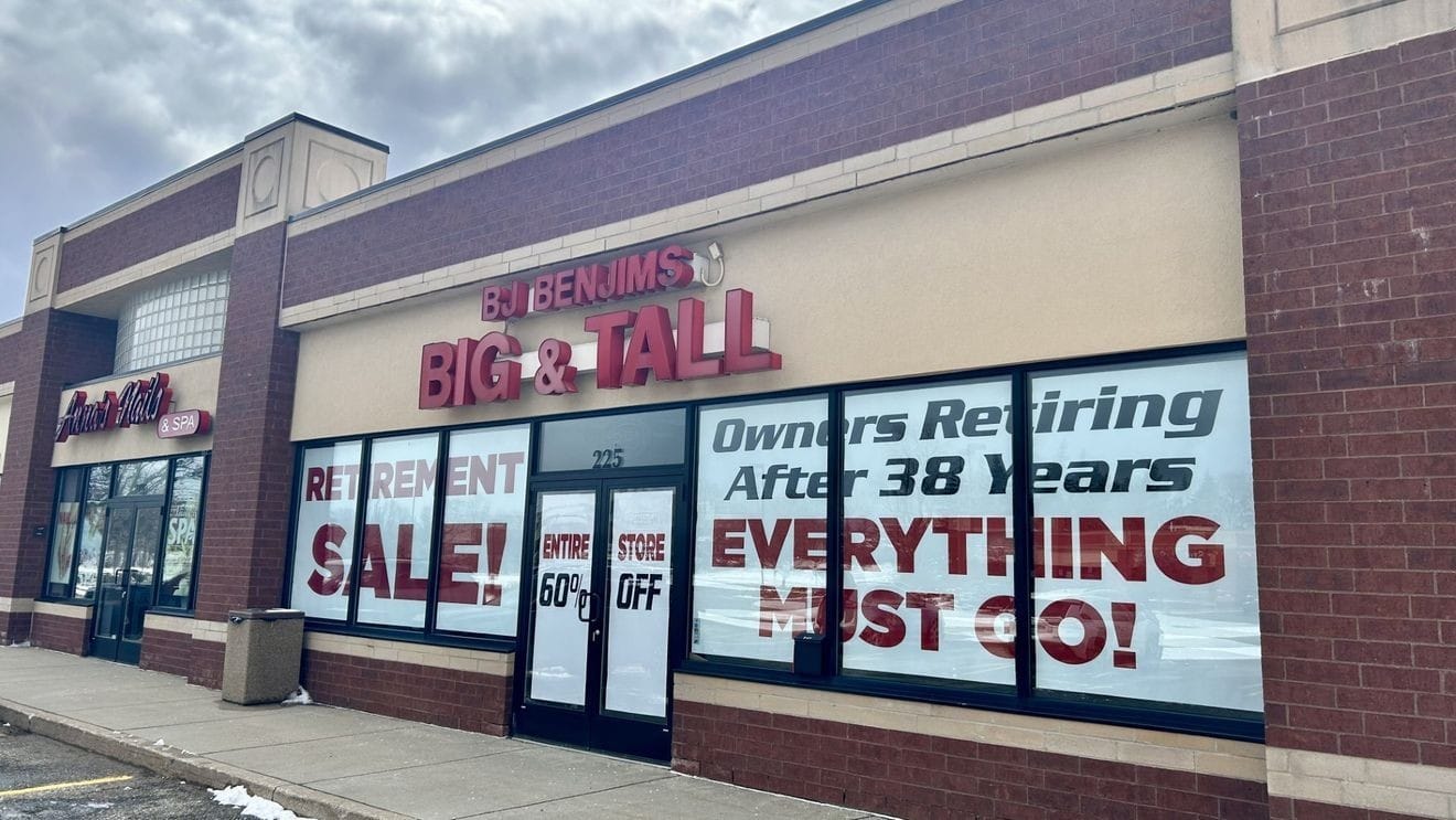 West Michigan storefront displaying a retirement and closing sale