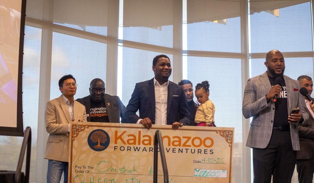 Cultivate 269 award check presented at the Western Michigan University pitch competition