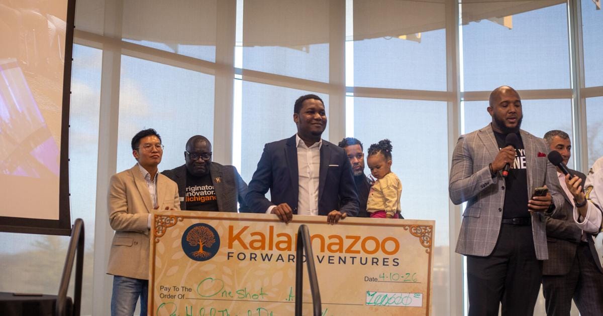 Cultivate 269 award check presented at the Western Michigan University pitch competition